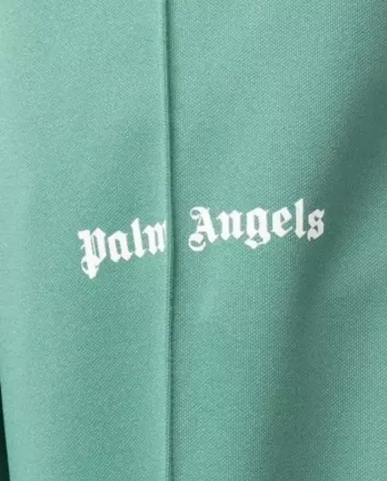 PALM ANGELS Зелені спортивні штани в смужку