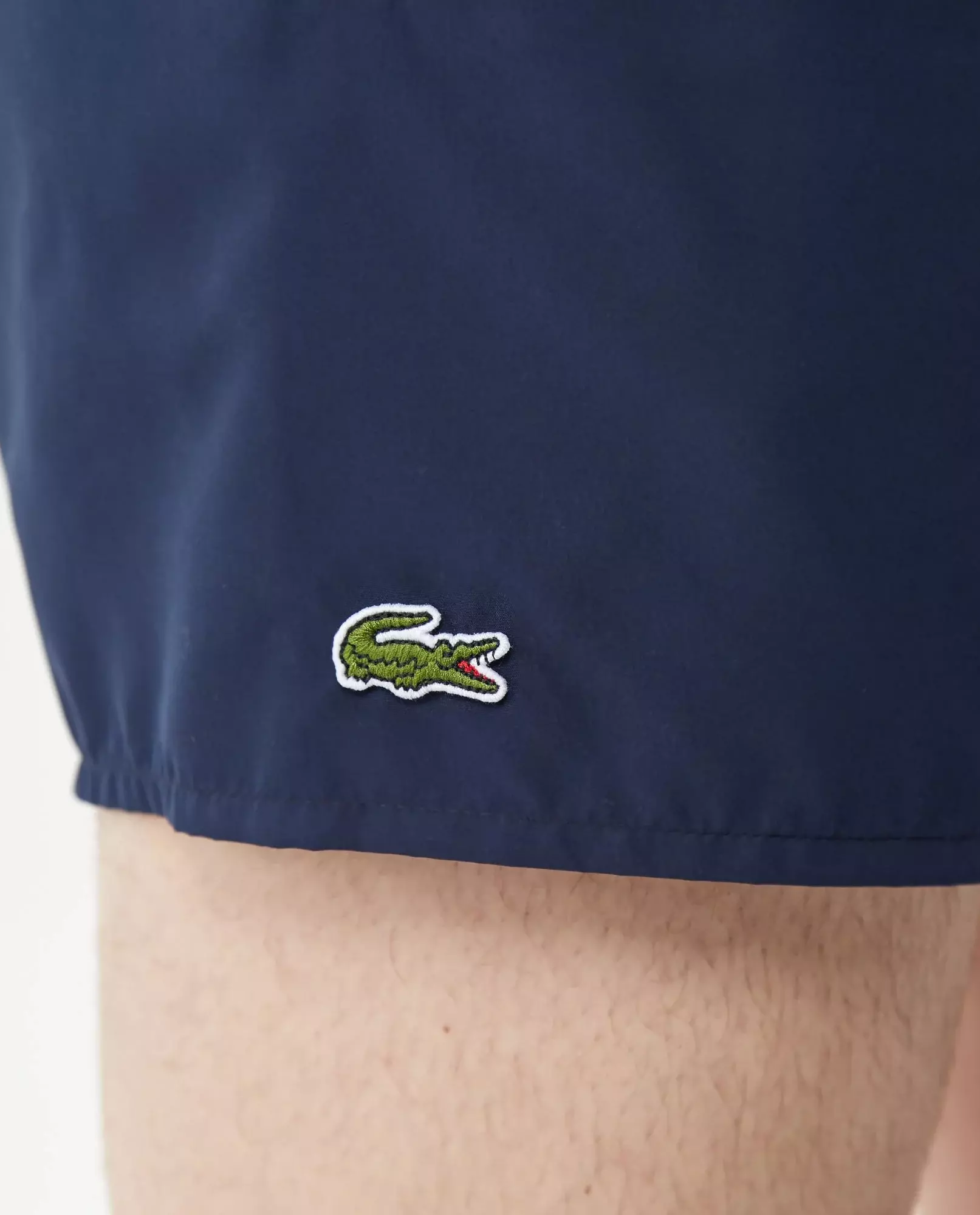 Темно-сині плавки LACOSTE з логотипом