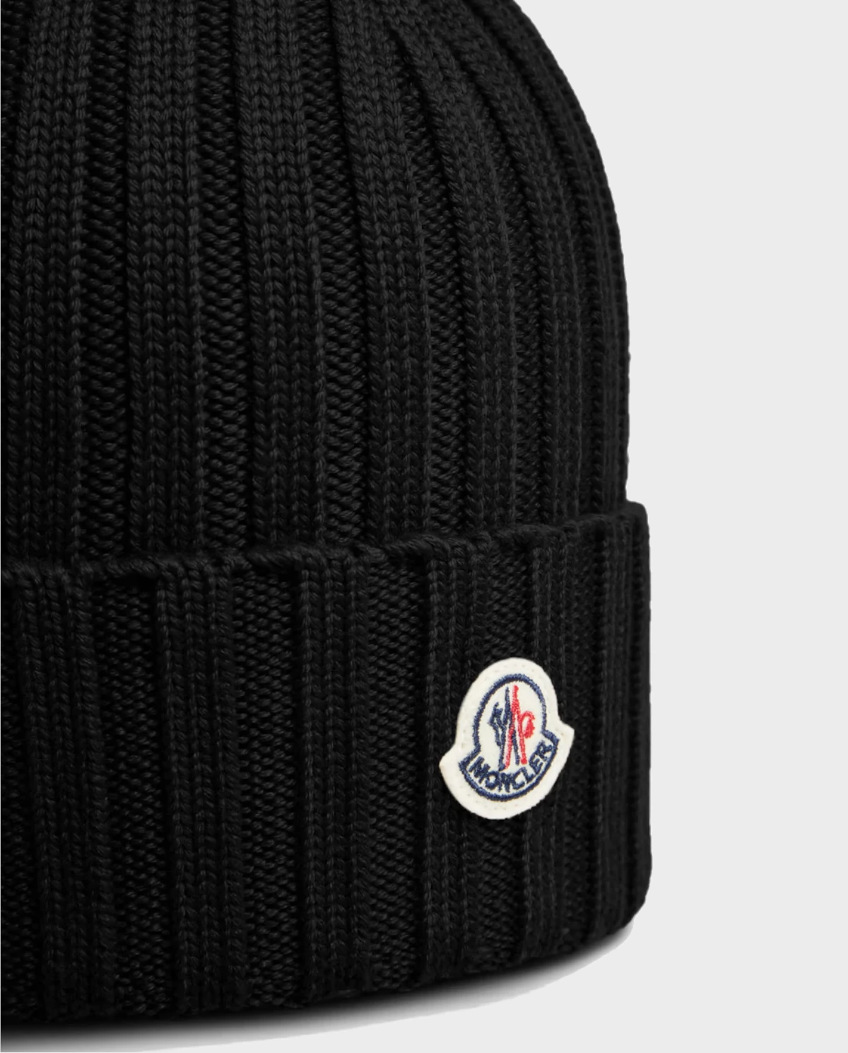 MONCLER Чорна вовняна шапка з логотипом