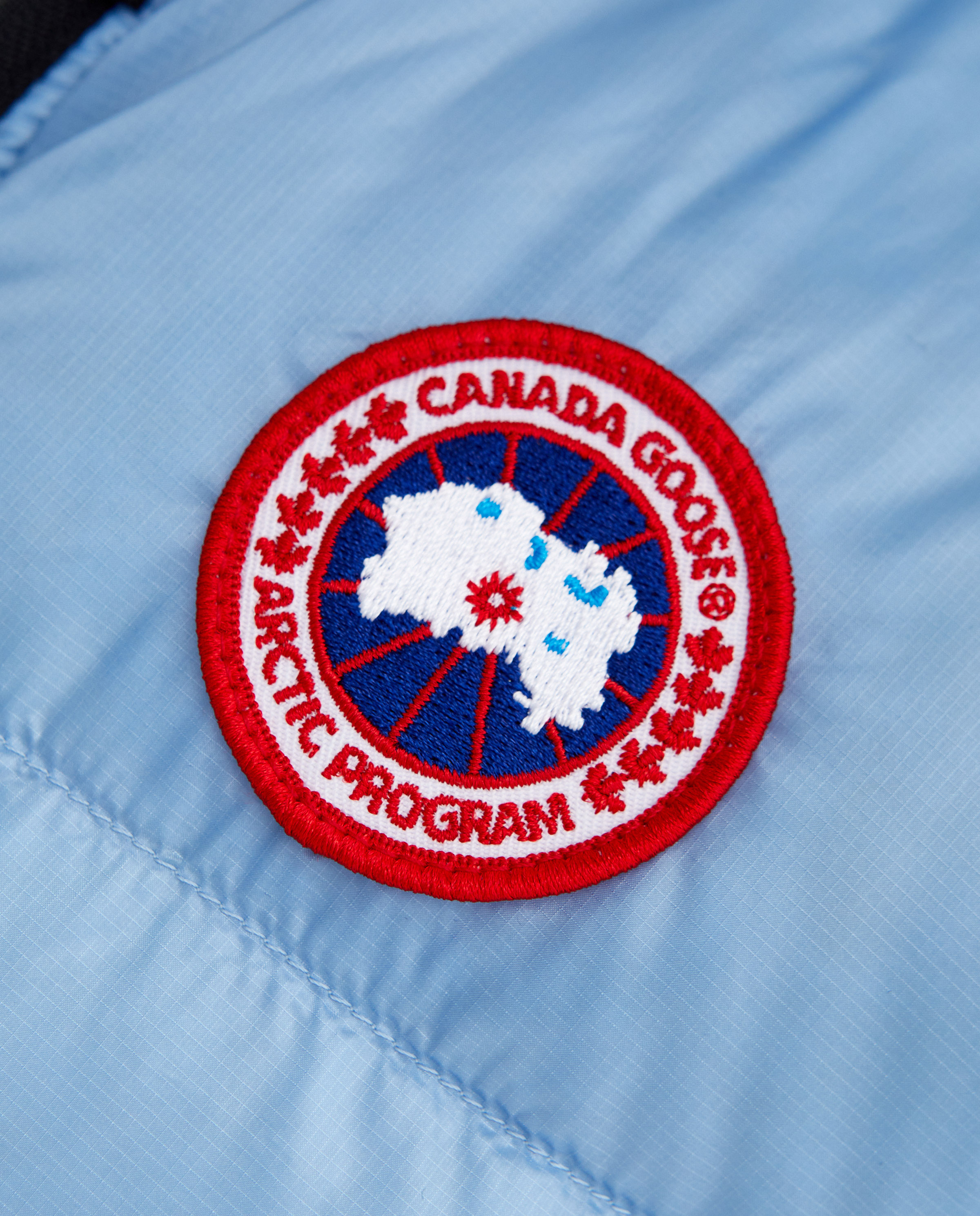 Синій пуховик CANADA GOOSE