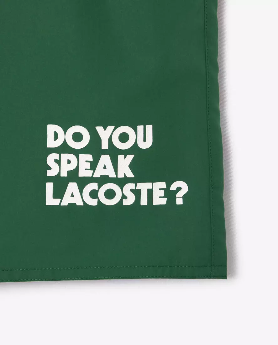 LACOSTE Зелені плавки з написом